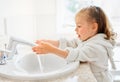 Girl is washing hands Royalty Free Stock Photo