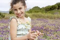 Cute Little Girl Wearing And Holding Necklace Of Flowers Royalty Free Stock Photo
