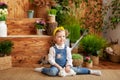 Cute little girl with white bunny in garden. Little girl with white rabbit. Child playing with pet bunny. Kid play with animal. Ch Royalty Free Stock Photo