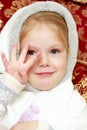 The little girl is waving her hand. Royalty Free Stock Photo