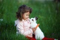 Cute little girl with white rabbit Royalty Free Stock Photo