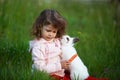 Cute little girl with white rabbit Royalty Free Stock Photo