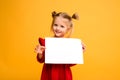 Baby girl holding white sheet Royalty Free Stock Photo