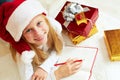 Cute little girl writes letter to Santa Claus Royalty Free Stock Photo