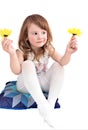 Cute little girl with yellow daisies isolated