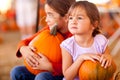 Cute Little Girls Holding Their Pumpkins At A Pump Royalty Free Stock Photo