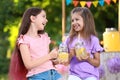 Cute little girls with natural lemonade. Summer refreshing drink Royalty Free Stock Photo