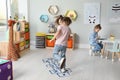 Cute little girls playing hopscotch Royalty Free Stock Photo