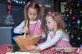 Cute little girls preparing gingerbread cookies Royalty Free Stock Photo