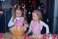 Cute little girls preparing gingerbread cookies Royalty Free Stock Photo