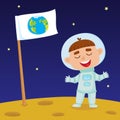 Cute little happy boy astronaut standing on Moon with Earth flag Royalty Free Stock Photo