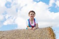 Cute little kid girl in traditional Bavarian costume in wheat field Royalty Free Stock Photo