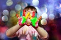 Cute little kid with painted hands Royalty Free Stock Photo