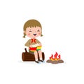 Cute little kid playing bongo drums, boy scout or girl scout sitting on a log by the campfire, Happy kids summer camp Royalty Free Stock Photo