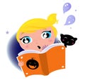 Cute little kid reading Halloween story book Royalty Free Stock Photo