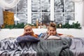 Cute little kids, boy and girl at home waiting for Santa Claus Royalty Free Stock Photo