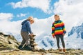 Children hiking in mountains Royalty Free Stock Photo