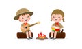 Cute little kids sitting on a log and playing guitar and bongo drums by campfire, boy scout or girl scout honor uniform