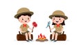 Cute little kids sitting on log and Roasting Fish and fish on campfire, boy scout or girl scout honor uniform, kids summer camp,