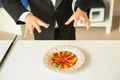 Cute little magician showing trick indoors, closeup Royalty Free Stock Photo