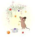 cute little mouse decorates a Christmas tree