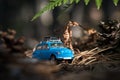 Cute little nonexistent retro car with luggage on top on a forest road Royalty Free Stock Photo
