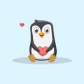 Cute little penguin holding red heart