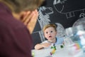 Cute little toddler boy at child therapy session.