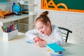 Cute little preschol kids drawing with colorful pencils. Cheerful smiling child girl at the blackboard. Royalty Free Stock Photo