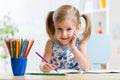 Cute little preschooler child drawing at home Royalty Free Stock Photo