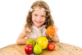 Cute little preschooler girl with fruits on the Royalty Free Stock Photo