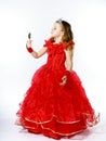 Cute little princess dressed in red isolated on white background