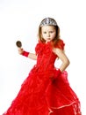 Cute little princess dressed in red isolated on white background