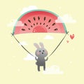 a cute little rabbit flies through the sky on a parachute in the form of a piece of watermelon
