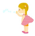 Cute little redhead girl blowing soap bubbles