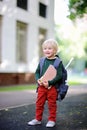 Cute little schoolboy with his backpack. Back to school concept. Royalty Free Stock Photo