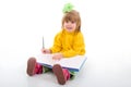 Cute Little Schoolgirl Sitting With A Books. Royalty Free Stock Photo