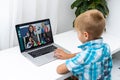 Cute little student online learning class study online video call zoom teacher.