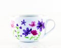 A cute little teacup with flowera on it. Royalty Free Stock Photo