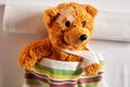 Cute little teddy bear with an arm in a sling Royalty Free Stock Photo