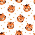 Cute little tiger head seamless childish pattern. Funny cartoon animal character for fabric, wrapping, textile Royalty Free Stock Photo