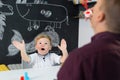 Cute little toddler boy at child therapy session.