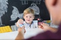 Cute little toddler boy at child therapy session.