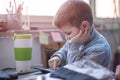 Cute little baby boy using a calculator Royalty Free Stock Photo