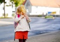 Cute little toddler girl on her first day going to playschool. Healthy happy child walking to nursery school. Kid with Royalty Free Stock Photo
