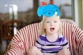 Cute little toddler girl with a self made puppy mask Royalty Free Stock Photo