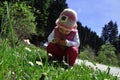 Cute little toddler girl smelling flowers Royalty Free Stock Photo