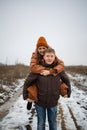 Cute And Loving Couple In Winter Outdoor.