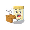 Cute macadamia nut butter cartoon character having a box