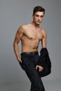 Cute man nude torso black shirt fashion attractiveness gray background